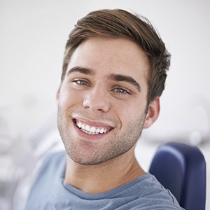Man sharing healthy smile during dental checkup and teeth cleaning visit
